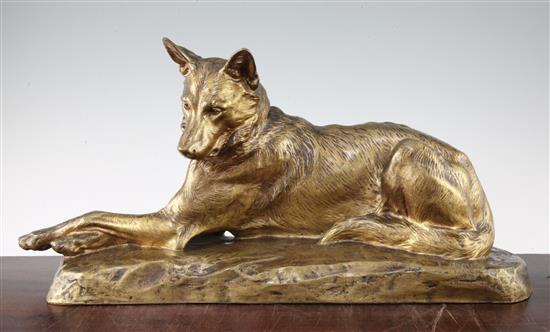 L. Riche. A gold patinated bronze model of a seated Alsatian, 21in.